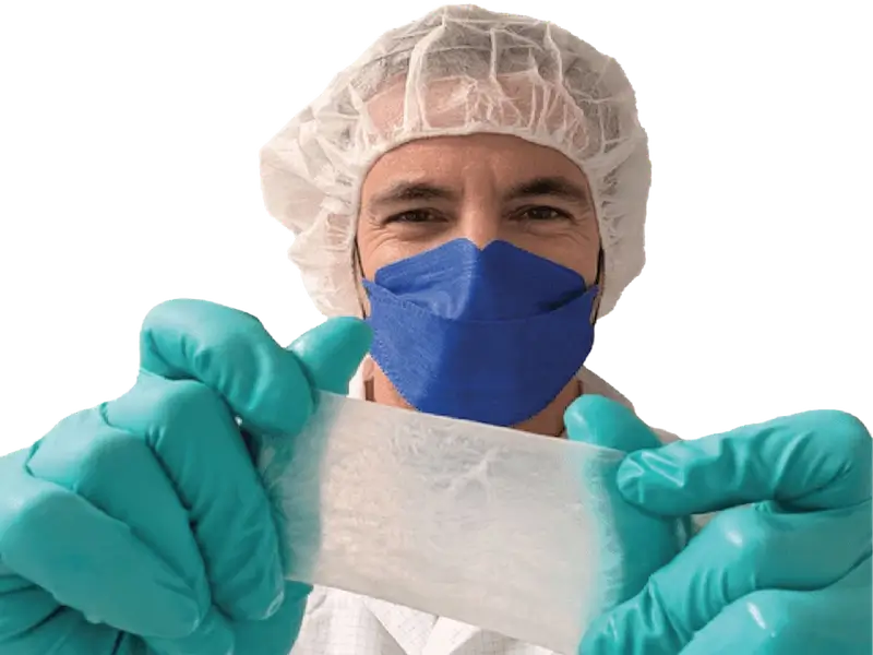 Hector holding a medical device